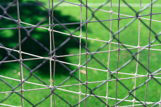 Soccer goal net. The net in front of the soccer field