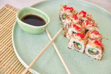 Fresh sushi rolls on a plate