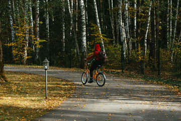 Fototapeta premium person riding a bike