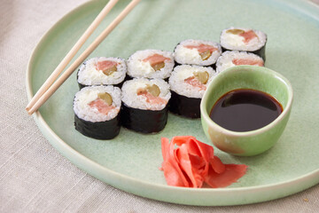 Fresh sushi rolls on a plate