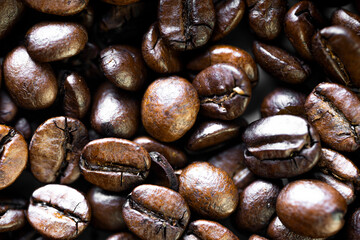 Macro shot of roasted coffee beans background
