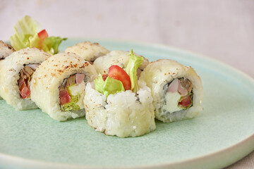 Fresh sushi rolls on a plate
