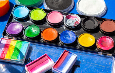 Fototapeta premium Different used colorful watercolor paint for drawing
