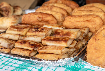 Appetizing delicious fried pies and filling pancakes