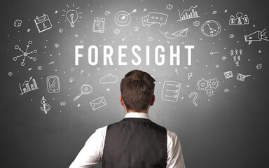 Rear view of a businessman with FORESIGHT inscription, modern business concept