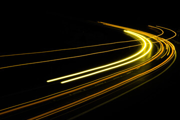 orange car lights at night. long exposure