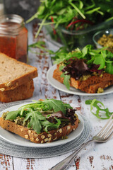 Sandwiches with pesto and green salad