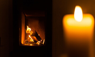 Contemplative ambience with candlelight and a warming open fire home contemplation christmas togetherness romance home living room recharge your batteries feel comfortable warmth energy