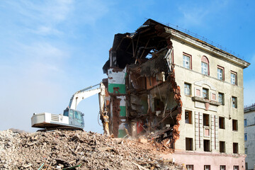 excavator loader machine at demolition construction site