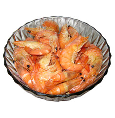 Boiled shrimp in a glass plate on a white background
