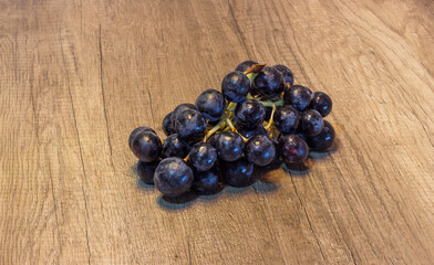 grape bunch on a wood table