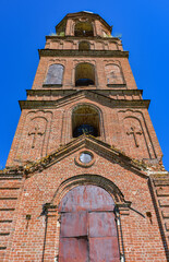 Fototapeta na wymiar Old brick abandoned orthodox Church of the Kazan Icon of the Mother. an abandoned Kazan church in the village of Bogorodskoe
