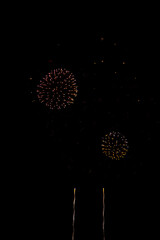 Colored fireworks on dark background texture. Surreal 