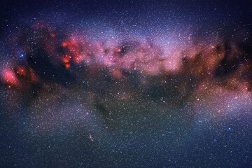 Space background with night starry sky and Milky Way. Red blue nebula