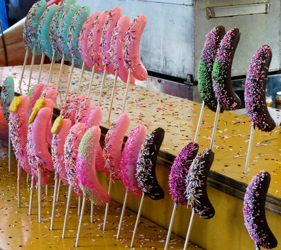Candy covered choco bananas with sticks, a traditional street food sold at a Japanese festival
