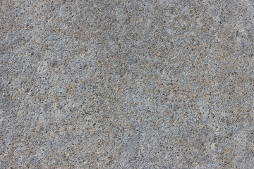 The texture of a natural stone slab from polished granite.
