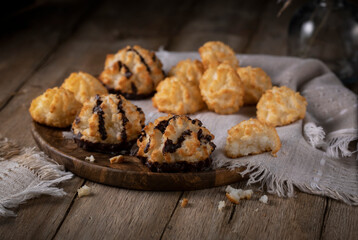 Coconut cookies on a wooden cup