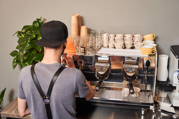 Bartender preparing espresso coffee