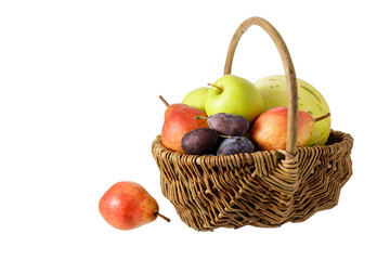 Basket with fruits isolated on white