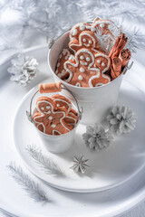 Homemade gingerbread man in white bucket for Christmas