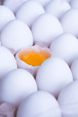 A broken egg inside the eggs