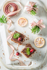 Brown gingerbread cake for Christmas with jam