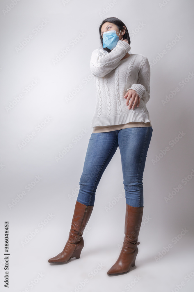 Wall mural woman posing with casual attire and jeans