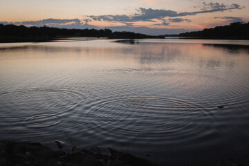 Water ripples on the lake at sunset