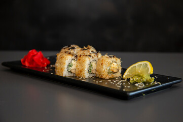 japanese sushi food. Maki ands rolls with tuna, salmon, shrimp, crab and avocado. Top view of assorted sushi. Rainbow sushi roll, uramaki, hosomaki and nigiri. Assorted sushi