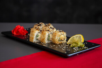 japanese sushi food. Maki ands rolls with tuna, salmon, shrimp, crab and avocado. Top view of assorted sushi. Rainbow sushi roll, uramaki, hosomaki and nigiri. Assorted sushi