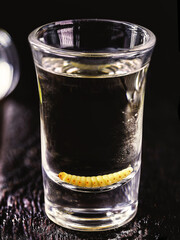 several glasses with mezcal (or mescal) is commonly known as 