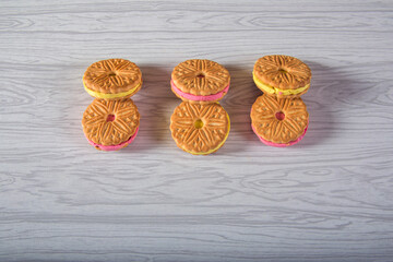 Sandwich cookies with filling in grey background