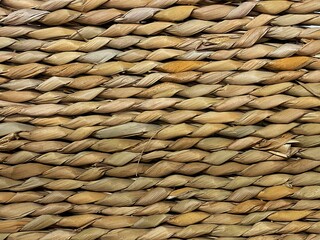 Close up photography of the weaving from straw. Abstract horizontal background with copy space.