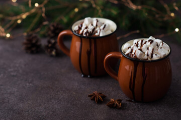 Christmas cocoa with marshmallows in a mug, new year's warming drink