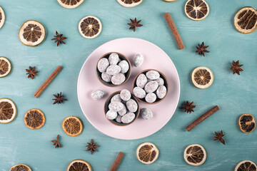 Spiced almonds with chocolate powder, traditional german christmas sweets with spices like cinnamon, anise, winter season