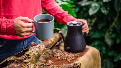 person with a cup of tea