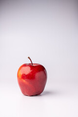 Red apple isolated against a white background