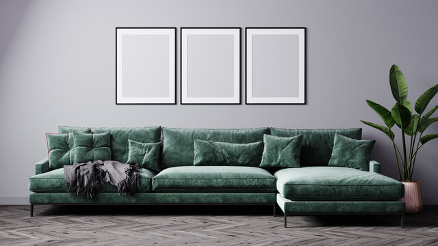 Mock-up frame in cozy light grey home interior background with green sofa and three frames.3d render