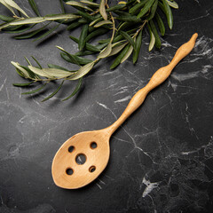 hand carved wooden spoon on the table