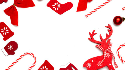 Christmas decoration isolated. Stocking, gifts, winter tree, ribbon and bow in shape frame on white...