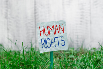 Handwriting text Human Rights. Conceptual photo Moral Principles Standards Norms of a showing...