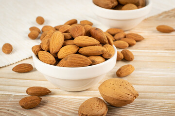 Heap of Raw Almonds on Rustic Background Closeup