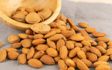 Heap of Raw Almonds on Rustic Background Closeup
