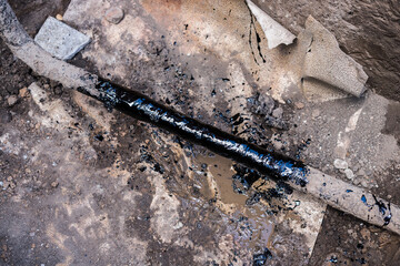 gas pipe in resin. Resin-treated pipe treated with resin.