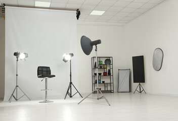 Fototapeta na wymiar Interior of modern photo studio with professional equipment