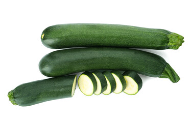 Cut and whole green ripe zucchini isolated on white, top view