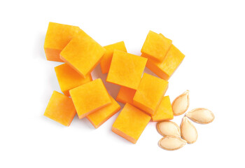 Pieces of ripe orange pumpkin and seeds on white background, top view