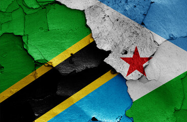flags of Tanzania and Djibouti painted on cracked wall
