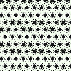 The seamless pattern of black sun and light green background can be used as background, wallpaper, web and etc