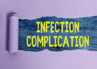 Writing note showing Infection Complication. Business concept for unwanted reaction resulted from...